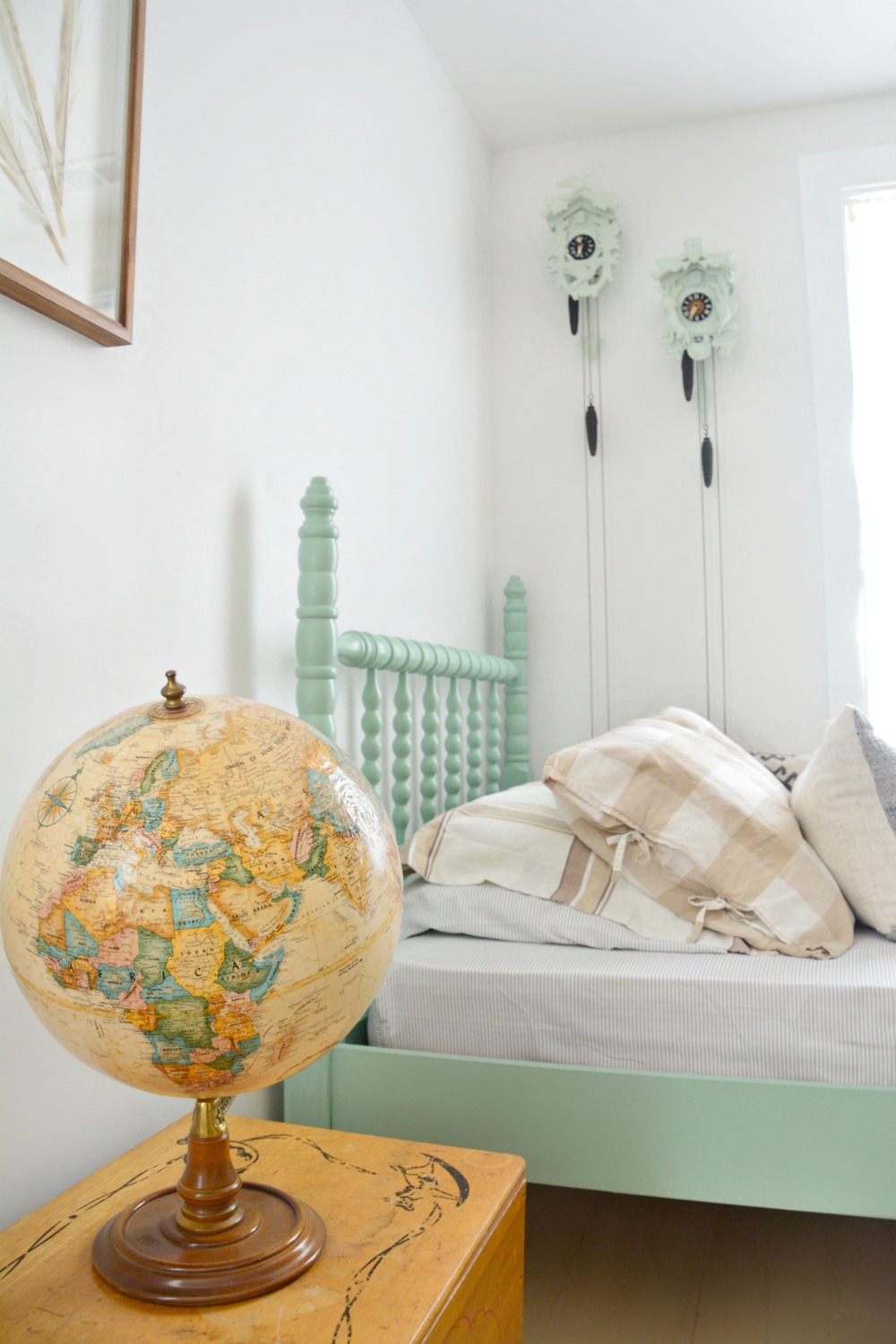 neutral-globe-and-painted-cuckoo-clocks